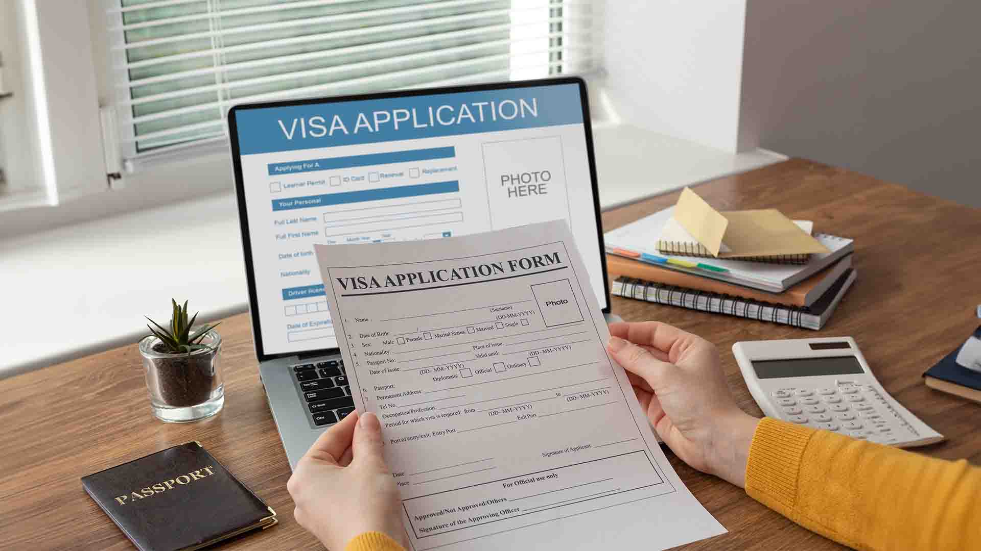 student on laptop, New Zealand visa application form