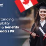 Smiling student holding a Canadian university degree
